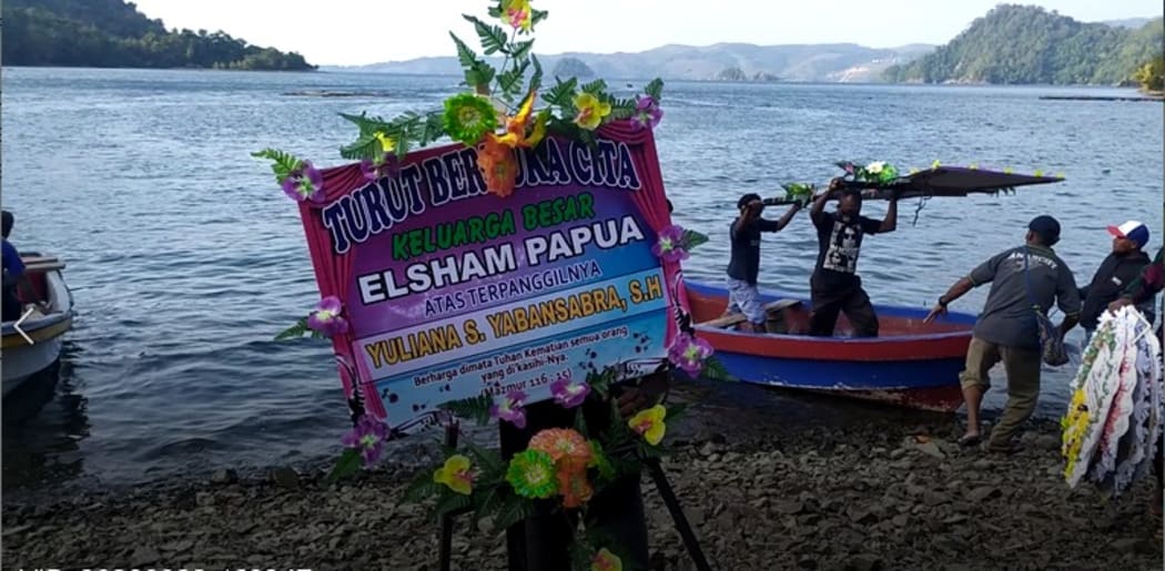Tribute paid to Papuan human rights defender Yuliana Yabansabra as she was buried in her village of Kendate, near Depapre in Papua, 22 August, 2020.