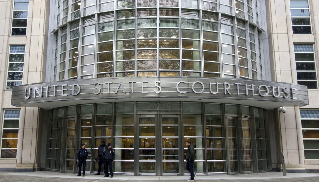 Police stand on duty for the start of jury selection for the El Chapo trial