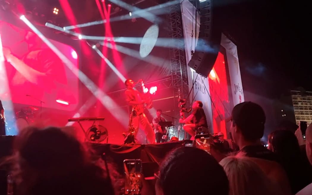 Drax Project's Shaan Singh plays a flaming saxophone during their set at Homegrown, on the Wellington waterfront, on 15 March, 2025.