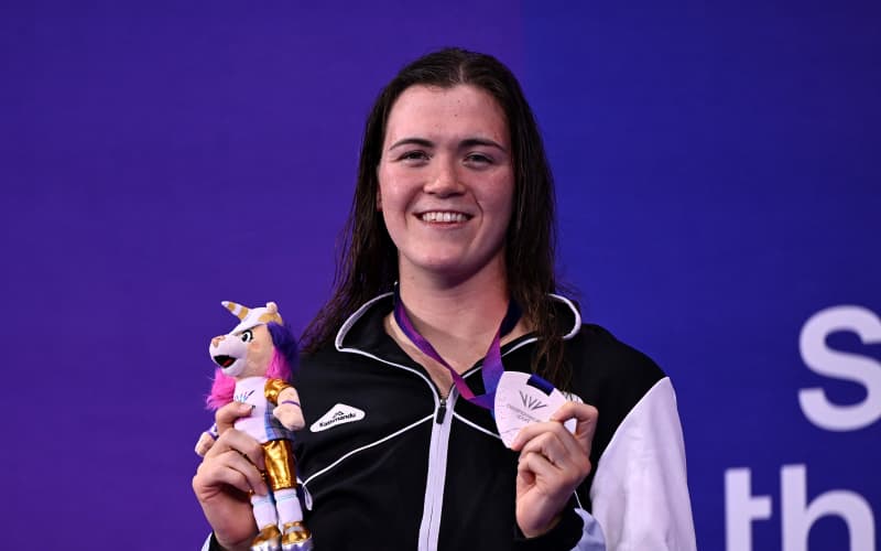 GLASGOW, SCOTLAND - JULY 24: Silver medalist Erika Fairweather of Team New Zealand poses for a photo with her medal during the medal ceremony for the Women’s 4 x 200m Freestyle Final on day one of the Glasgow 2026 Commonwealth Games at Tollcross International Swimming Centre on July 24, 2026 in Glasgow, Scotland. (Photo by Quinn Rooney/Getty Images)