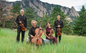 First violinist Edward Dusinberre, left, and the Takács Quartet.