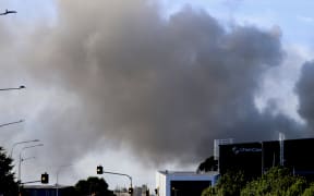 Smoke over James Fletcher Drive on Wednesday morning.