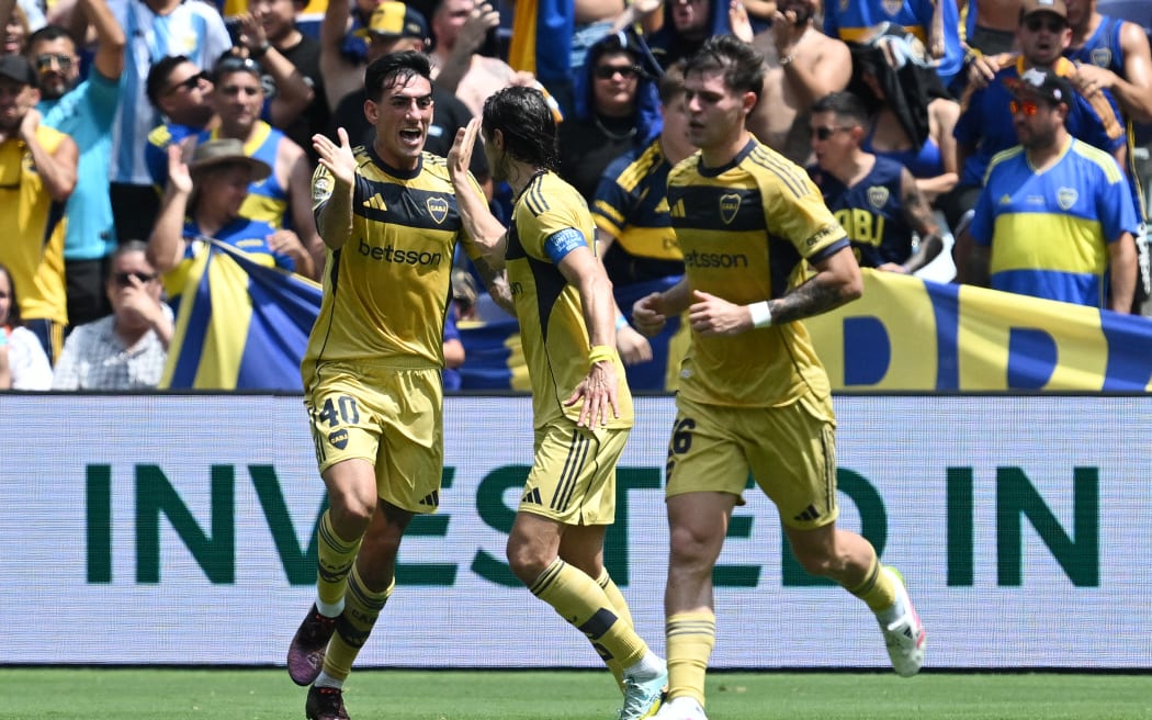 Boca Juniors' Argentine defender #40 Lautaro Di Lollo, left, celebrates with teammates after scoring his team's first goal during the FIFA Club World Cup 2025 Group C football match between New Zealand's Auckland City and Argentina's Boca Juniors at the Geodis Park stadium in Nashville on June 24, 2025.