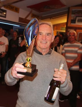 Adrian Pickering with the spoils of being the first 80 plus competitor at the Easter Masters daisy