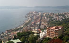 A picture shows the village of Pozzuoli in the Campi Flegrei (Phlegraean Fields) volcanic region in Pozzuoli on October 13, 2023. There have been many tremors in recent weeks, including two 4 magnitude quakes, the strongest in over 40 years. (Photo by Eliano Imperato / Controluce via AFP)
