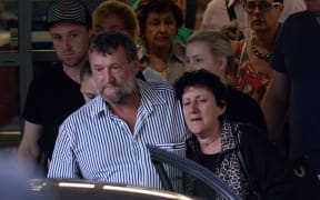Greg and Virginia Hughes, parents of Australian cricketer Phil Hughes, leave the hospital after his death.