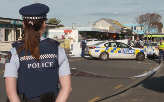 Police at the scene of a hit and run by a white van in New Brighton