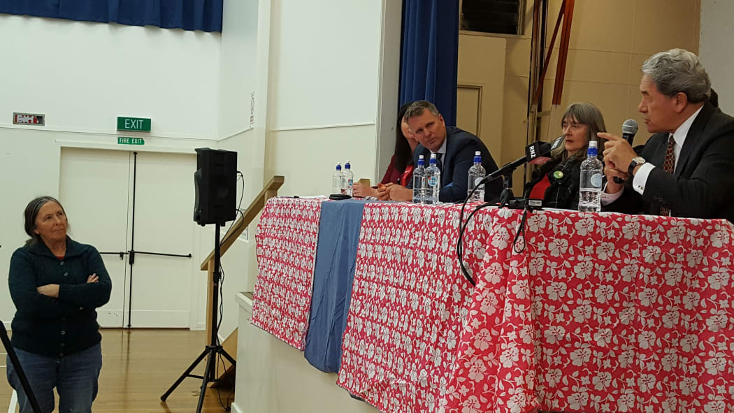 New Zealand First leader Winston Peters speaking at a meeting in Kaikohe as (from right) Catherine Delahunty, Matt King and Willow-Jean Prime (obscured) listen.