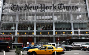 The New York Times logo is seen on the building in New York City, United States on October 27, 2022. (Photo by Jakub Porzycki/NurPhoto) (Photo by Jakub Porzycki / NurPhoto / NurPhoto via AFP)