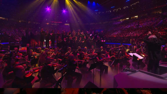 The orchestra plays music from the game ahead of the grand final confrontation.