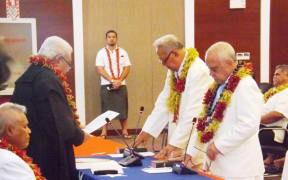 Tuiloma Pula Lameko [on the left] being sworn in as a deputy head of state alongisde Le Mamea Ropati