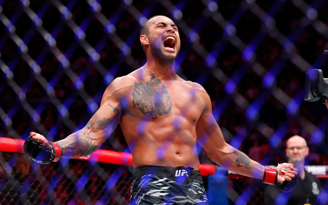 Carlos Ulberg of New Zealand celebrates his win after his knockout against Dominick Reyes of the USA during the UFC Fight Night event at RAC Arena in Perth, Sunday, September 28, 2025. (AAP Image/James Worsfold/ Photosport)