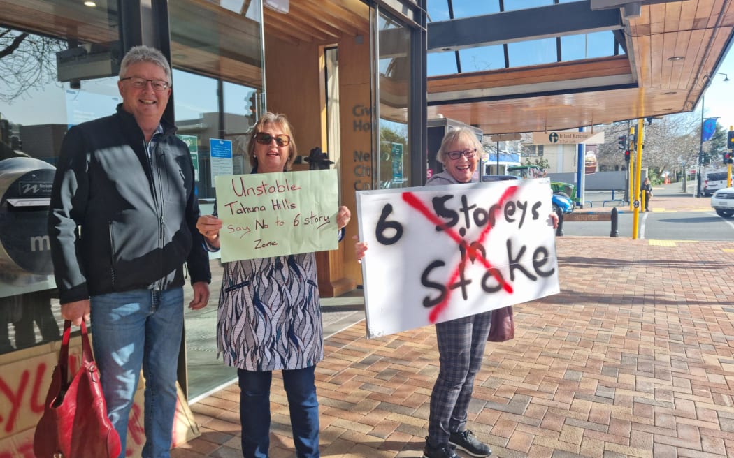 Residents protesting Plan Change 29 outside the Nelson City Council. The plan is proposing greater housing intensification in the city.