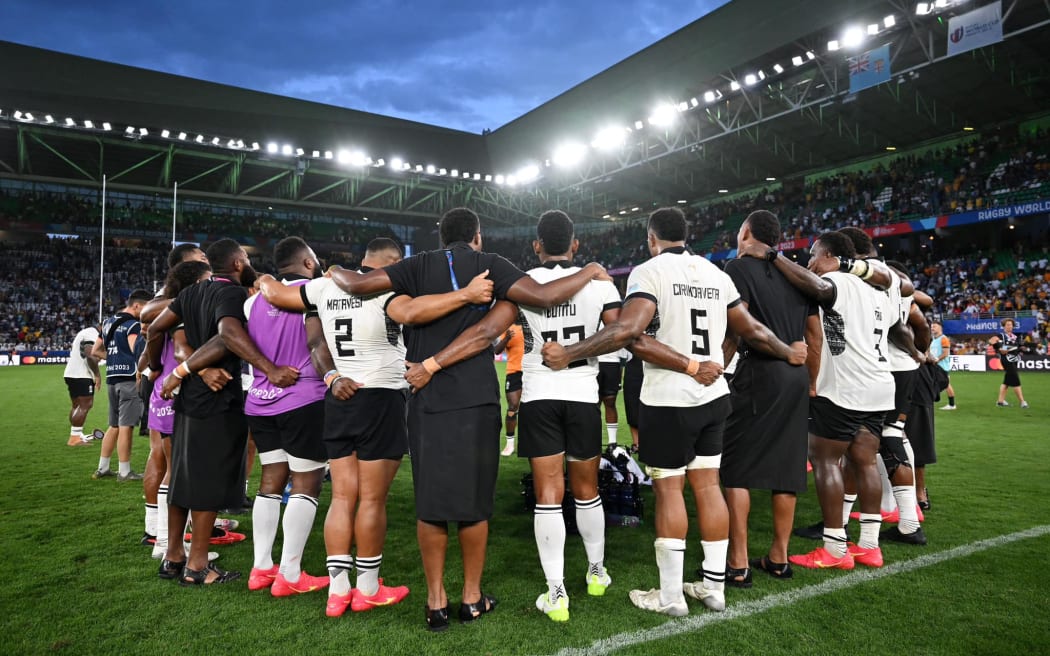 SAINT-ETIENNE, FRANCE - SEPTEMBER 17: The players of Fiji form a huddle at full-time following the Rugby World Cup France 2023 match between Australia and Fiji at Stade Geoffroy-Guichard on September 17, 2023 in Saint-Etienne, France. (Photo by Pauline Ballet - World Rugby/World Rugby via Getty Images)