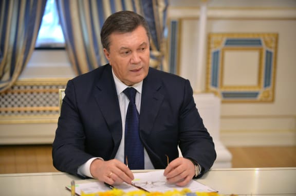 Ukrainian President Viktor Yanukovych looks on before signing the deal in Kiev.