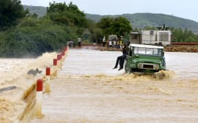 A car crossing during flooding in Sauga on the Gorom Gorom track in September 2020.