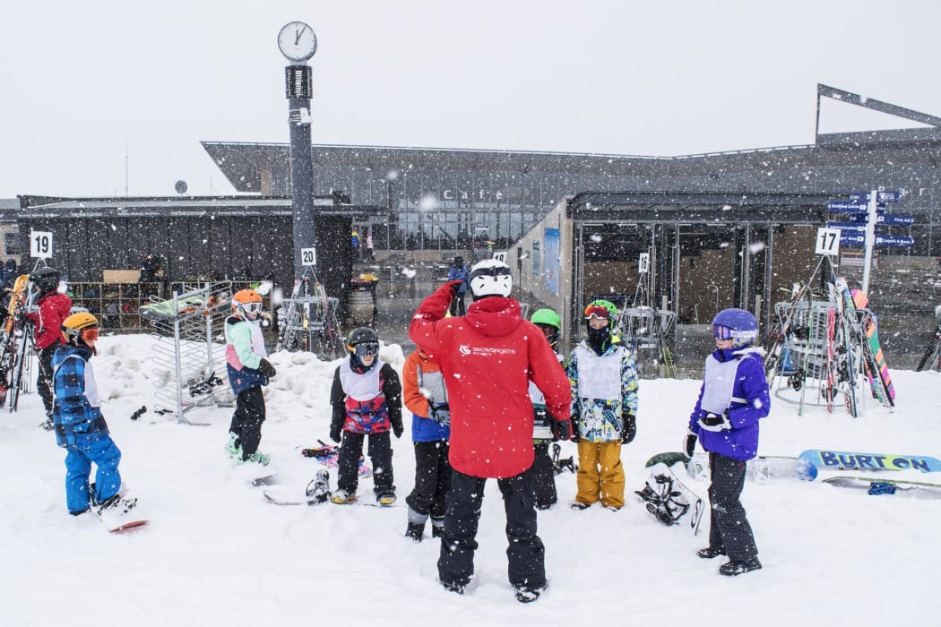 Children playing on Coronet Peak.