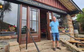 Sign of Kiwi cafe owner Eric Devos
