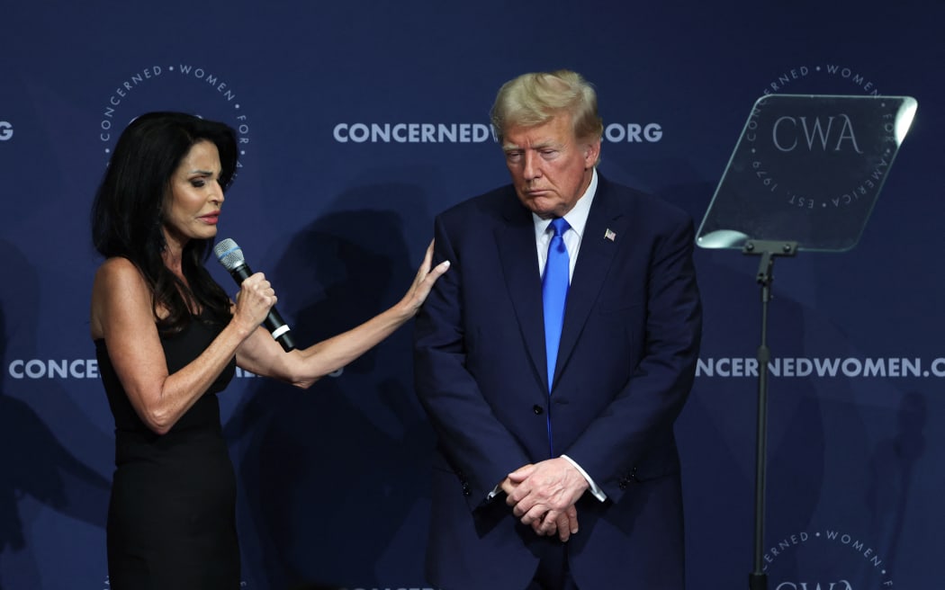 CWA president Penny Nance led the group in prayer with former President Trump after his speech