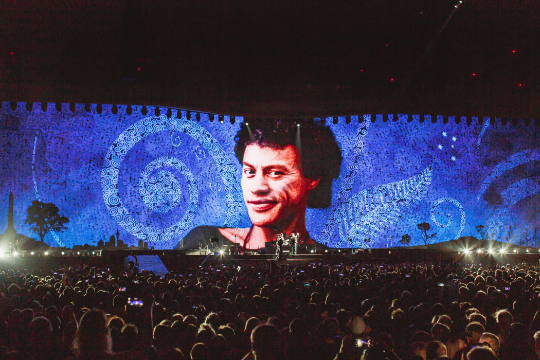 An image of U2's Kiwi roadie Greg Carroll, being projected at the band's Mt Smart Stadium concert