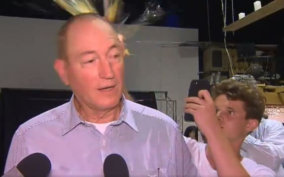 The moment a young man broke an egg on Australian Senator Fraser Anning's head.