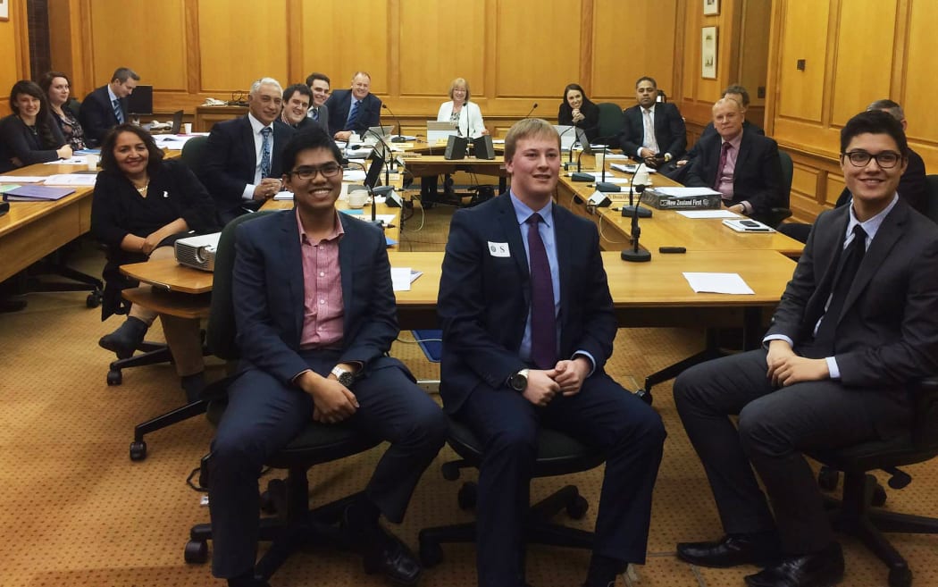 Jason Sebastian, Brad Olsen and Josiah Tualamali’I at select committee.
