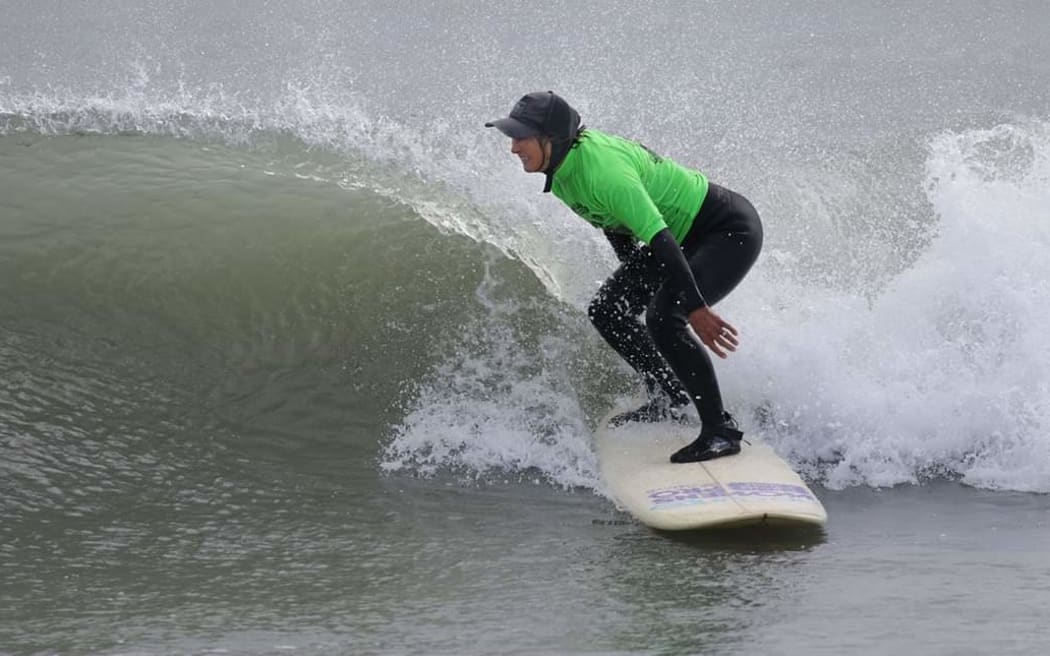 Former world age group champion Kathy Steed, 73, in action at the Easter Masters Surfing Championships in Taranaki.