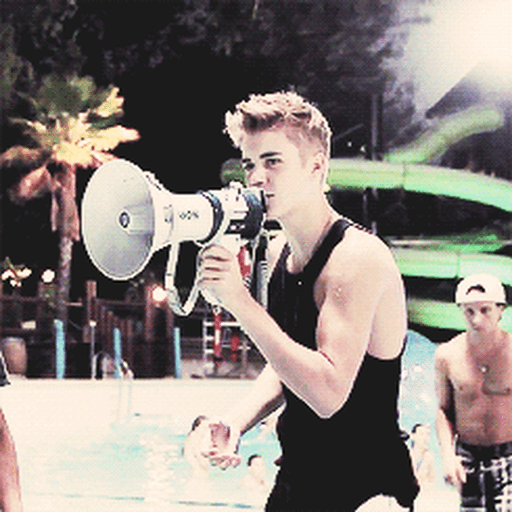 A gif of Justin Bieber with a megaphone