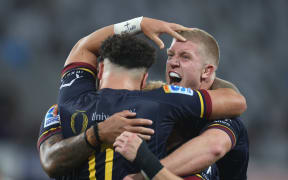 The Highlanders celebrate.