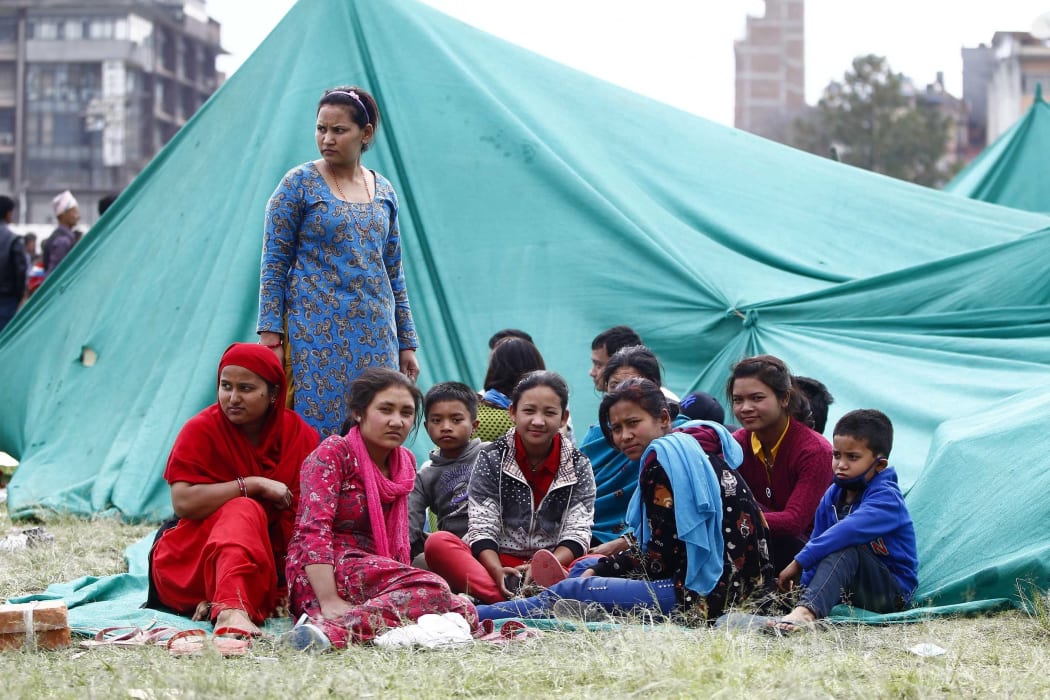 Tent cities are springing up in Nepal, as hospitals struggle to cope.