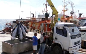 Small Pacific island states and powerful foreign fishing nations are heading for a showdown next week over management of the world's largest tuna fishery.