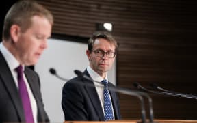 Director-General of Health Dr Ashley Bloomfield (right) listens to Minister for Covid-19 Response Chris Hipkins during a Covid media briefing on 3 November 2020.