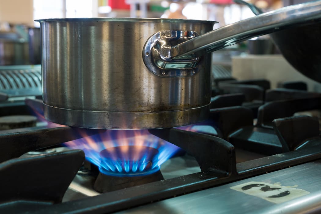 A pot on a gas-powered stove