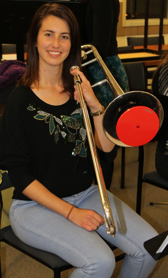 A photo of Trombonist, Charlotte Crone.