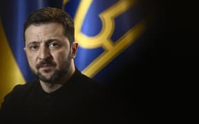 Ukraine's President Volodymyr Zelensky delivers a press conference at the headquarters of French national public television broadcaster "France Televisions" in Paris, on March 27, 2025. President Zelensky arrived in Paris on March 26, 2025, to attend the summit "Coalition of the willing" aimed at boosting Ukrainian security ahead of any potential ceasefire with Russia. (Photo by JULIEN DE ROSA / AFP)