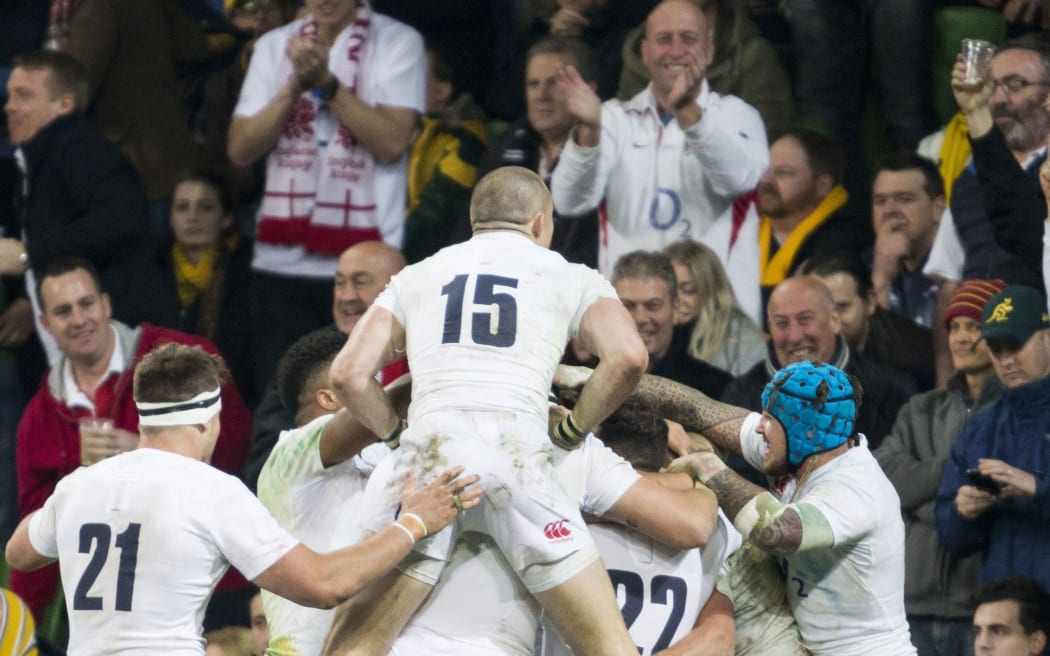 England rugby team celebrates win over Australia 2016.