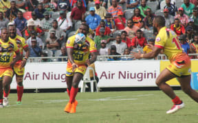 PNG Hunters captain Ase Boas sends the ball wide.