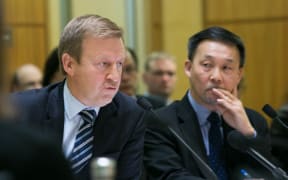 Minster of Health Jonathan Coleman (left) and Director-General of Health Chai Chua (right) speak to the Health Committee about the budget for 2017.