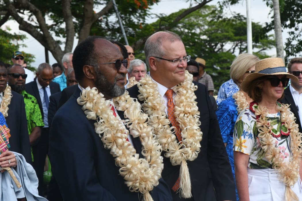 Scott Morrison with Carlot Salwai (left) during his visit to Vanuatu