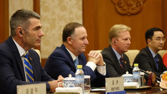 Primary Industries Minister, Nathan Guy, sits alongside the Prime Minister, the Trade Minister and National MP Jian Yang during talks with President Xi, Beijing.