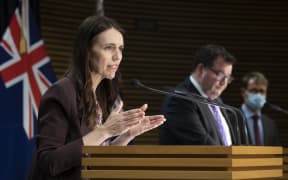 Prime Minister Jacinda Ardern and Deputy Prime Minister Grant Robertson during the post-Cabinet press conference with director general of health Ashley Bloomfield.