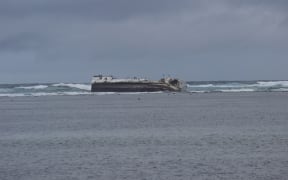 The Seahawk No.68 aground on a reef near Pago Pago.
