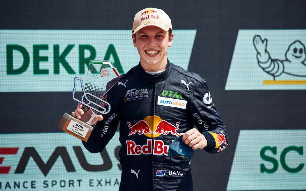 Liam Lawson on the podium after winning the season-opening DTM at Autodromo Nazionale Monza, Italy on June 19, 2021.