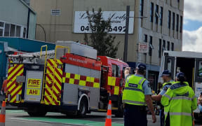 Firefighters using a drone to check the Loafers Lodge hostel building, on Tuesday 16 May, 2023