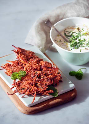 Beetroot and Carrot Fritters with mint lime and yoghurt dressing