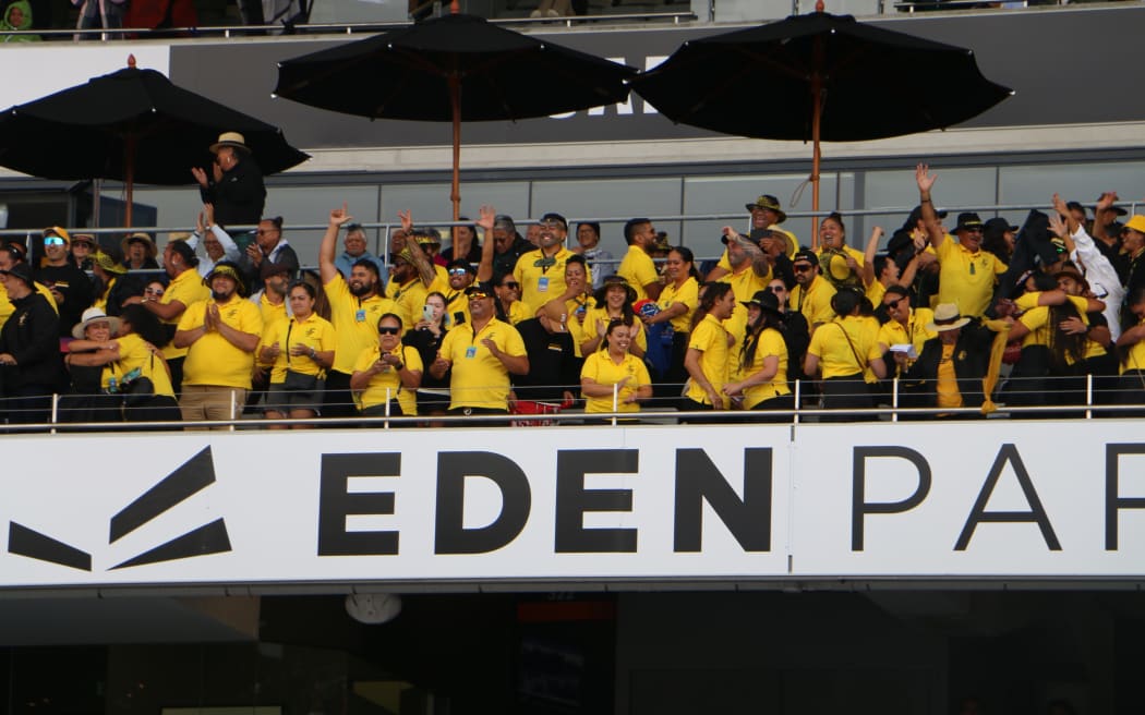Te Whānau-a-Apanui members cheer at Eden Park.