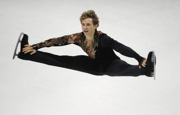US Adam Rippon performs during the Men Free Skating competition of the World Figure Skating Championships on March 25, 2010 at the Palavela ice-rink in Turin.  AFP PHOTO / DAMIEN MEYER (Photo by DAMIEN MEYER / AFP)