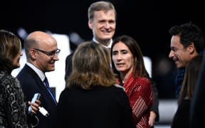 Chile's Minister of Environment and COP25 president Carolina Schmidt (C) talks with delegates as she arrives for the start of the closing plenary session of the UN Climate Change Conference COP25 in Madrid.