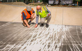 Masterton District Council staffers Kane Harris and Corin Haines, assessing the damage at the skatepark.