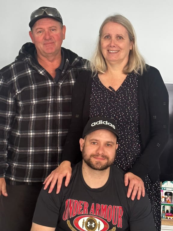 Wes Tomich with his father Anthony and mother Lee-ann.